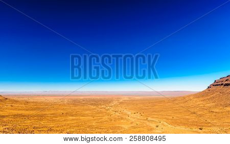 Remote Dry Hammada Landscape By M'hamid In Morocco