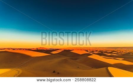 Sunrise In The Sahara Desert Next To M'hamid In Morocco