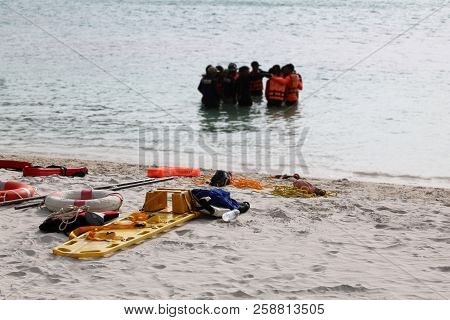 Edical Emergency Tool Bag Or First Aid Kit On The Beach With People Who Rescue And Cpr Training Or P