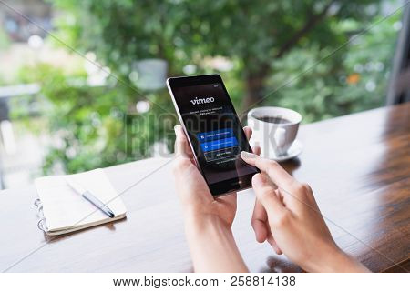 Chiang Mai, Thailand - August 18,2018: Woman Hands Holding Huawei With Vimeo On Screen.  Vimeo Is A 