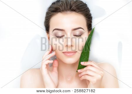 Portrait Of Young Sexy Female Woman Adult With Clean Pure Skin Taking Spa Smiling Relaxing In Bath W