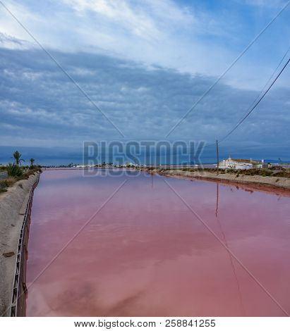 Pink Salt Pool In Saltmine, Wide Angle View At Sunrise