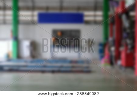 Hydraulic For Car Lift Up In Auto Repair Service Shop. Scissor Jack In Garage. Automobile Maintenace