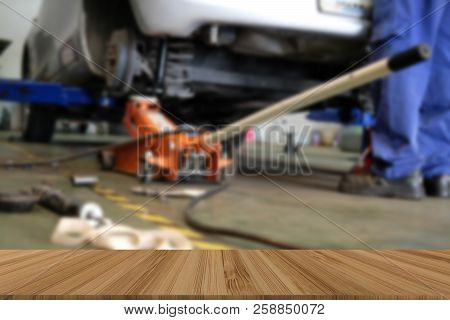 Car Lift Up For Shock Absorber & Spring Replacement In Auto Repair Garage