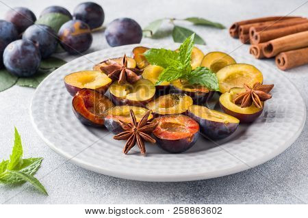 Fresh Berries Plums In The Context Of Cooking On The Plate