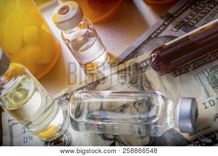 Vials With Different Substances Over Dollar, Concept Of Copayment
