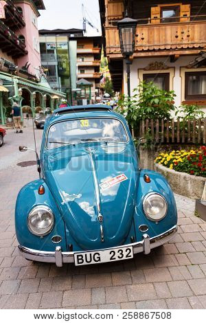 Saalbach-hinterglemm, Austria - June 21 2018: Vintage Car Volkswagen Beetle Oldsmobile Veteran On Ju