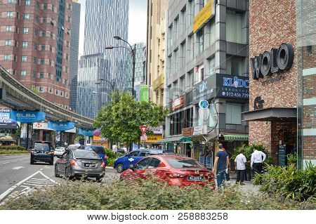 Kuala Lumpur, Malaysia - 9 September, 2017: People And Cars Are Seen In The Popular Bukit Bintang Di