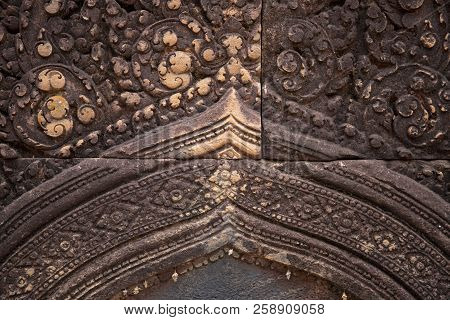 Stone Carved Bas-relief Of Banteay Srei Temple In Angkor Wat, Cambodia. Floral Ornament Bas-relief O
