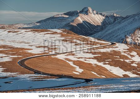 Trail Ridge Road, the highest (12,183 feet) continuous highway in the USA in high alpine tundra with rocks and mountains at autumn. Rocky Mountain National Park in Colorado, USA. 
