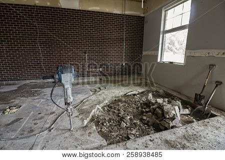 Pneumatic Plugger, Jackhammer, Used In A Reconstruction Of Building And Broken Concrete Floor