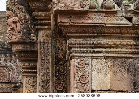 Stone Carved Bas-relief Of Banteay Srei Temple In Angkor Wat, Cambodia. Traditional Bas-relief On Ca