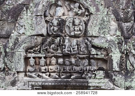 Stone Carved Bas-relief Of Banteay Samre Temple In Angkor Wat, Cambodia. Deity Figure Bas-relief. Kh