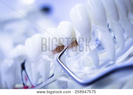 Dentist Cleaning Teeth