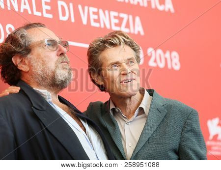 Julian Schnabel and Willem Dafoe attend 'At Eternity's Gate' photocall during the 75th Venice Film Festival at Sala Casino on September 3, 2018 in Venice, Italy. 