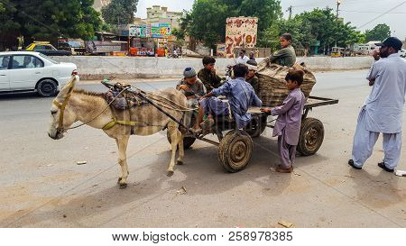 Children Running Donkey Cart In Karachi, Pakistan 25/07/2018