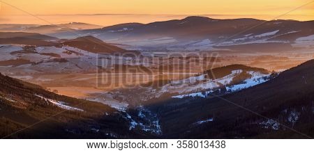 Winter Panorama Of Morava Valley From Snieznik Summit In Sunset Light