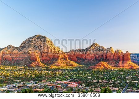 Sedona, Arizona, USA downtown cityscape and mountains.