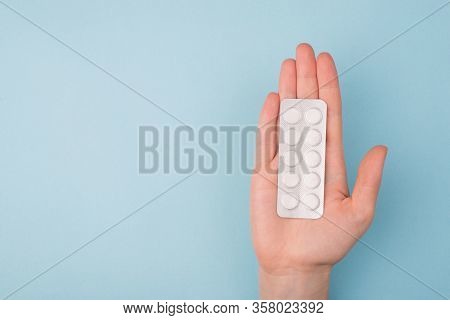 Doctor Hand Stretching Hand To Patient And Give Pills Concept. Top Above Overhead First Person Pov C