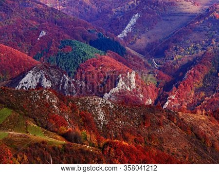 aerial view of Carpathian mountains countryside in autumn morning, Romania