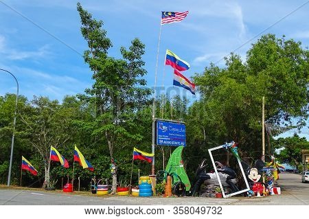 Labuan,malaysia-feb 11,2020:view Of The Entrance To Tanjung Aru Village With Colourful Malaysian & L