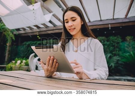 Working Women Stay Home Use Tablet Work At Home And Meeting With Team Online By Internet,wfh Concept