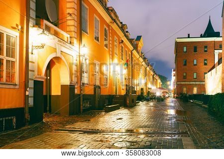 Riga, Latvia. Facades Of Old Famous Jacobs Barracks And Part Of Old The City Wall In Torna Street In