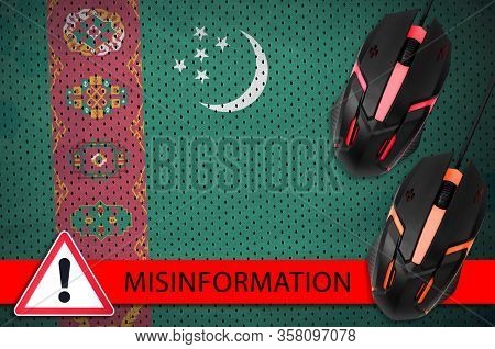Turkmenistan Flag And Two Computer Mouses. Misinformation During Coronavirus Or 2019-ncov Virus Conc