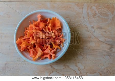 Small Bowl Of Delicate Cinnabar Chanterelle Mushrooms, Vegetarian Vegan Food Ingredient, Copy Space,