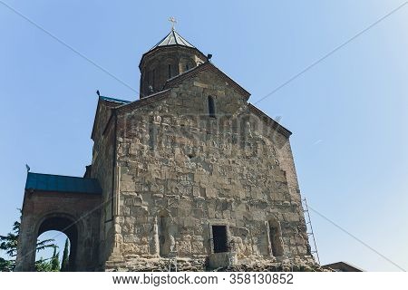 Tsminda Sameba Church Near Kazbegi Stepancminda Village, Georgia, Caucasus.