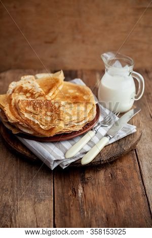 A Stack Of Thin Pancakes On A Plate. Homemade Pastries. Pancakes For Breakfast. Appetizing Food. Thi