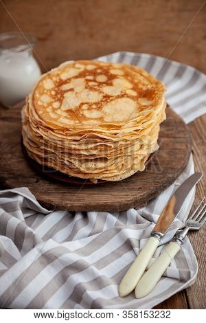 A Stack Of Thin Pancakes On A Plate. Homemade Pastries. Pancakes For Breakfast. Appetizing Food. Thi