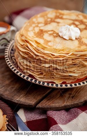A Stack Of Thin Pancakes On A Plate. Homemade Pastries. Pancakes For Breakfast. Appetizing Food. Thi
