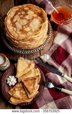 A Stack Of Thin Pancakes On A Plate. Homemade Pastries. Pancakes For Breakfast. Appetizing Food. Thi