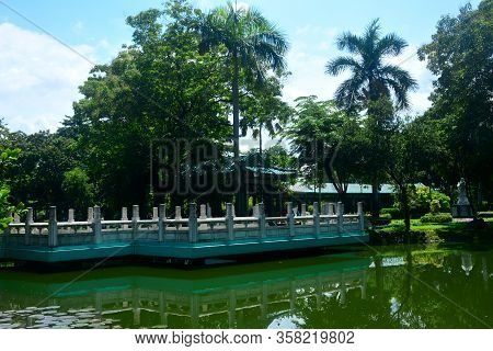 Manila, Ph - July 6: Bridge And Lake At Chinese Garden Inside Rizal Park On July 6, 2016 In Manila, 