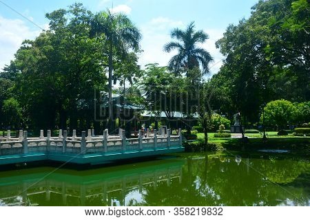 Manila, Ph - July 6: Bridge And Lake At Chinese Garden Inside Rizal Park On July 6, 2016 In Manila, 
