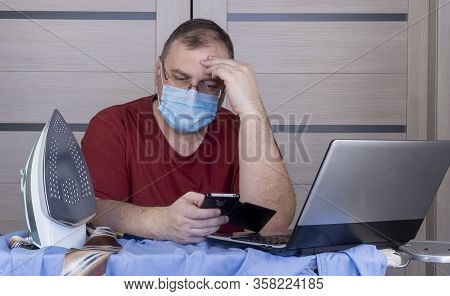 Quarantine Due Coronavirus Pandemic. Stay At Home. Business Man Working From Home, Wear A Protective