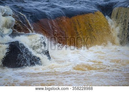 Threshold Of The Voitsky Padun Waterfall Close Up On February Day. Karelia, Russia