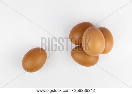 Raw Chicken Egg Isolated On White Background, Space For Text.