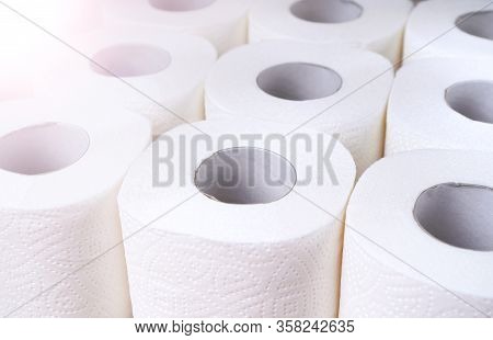 Toilet Paper Supplies Background. Wc Paper Rolls Top View. Goods Required For Quarantine.