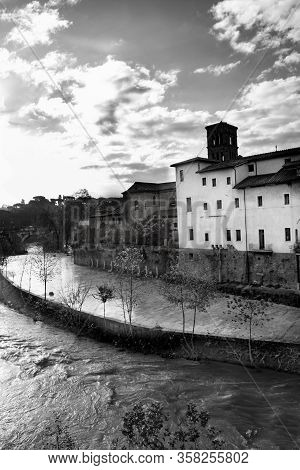 Tiber Island In Rome With The Tiber River