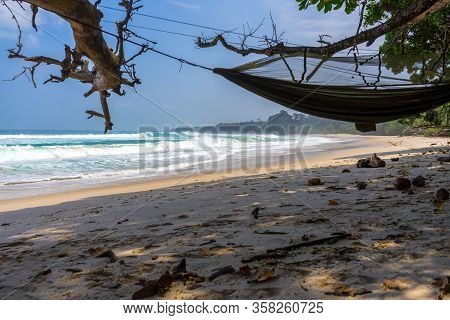 Wild Camping With A Hammock At Undiscoverd Beach Amazing Location In Bengkulu Province, Sumatra, Ind