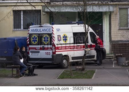 Kiev, Ukraine - March 26, 2020: Ambulance Near The Entrance Of An Apartment House