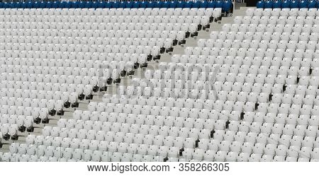 Empty White Seats At The Stadium During Quarantine