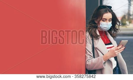 Young Woman Wearing Protection Face Mask Against Coronavirus Covid-19 Aka 2019-ncov Is Looking For I