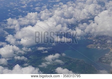 Aerial View Through The Clouds. Flight Over France