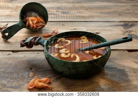 Shrimps Cooked In Tomato Soup. Unusual Plate With Tomato Soup And Shrimp.