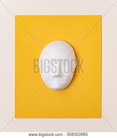 white paper mache mask, top view