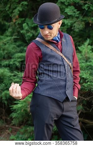 Steampunk Retro Adwenturer Guy In Bowler Hat Wit Coin
