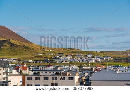 View Over Town Of Heimaey In Iceland On A Sunny Summer Day